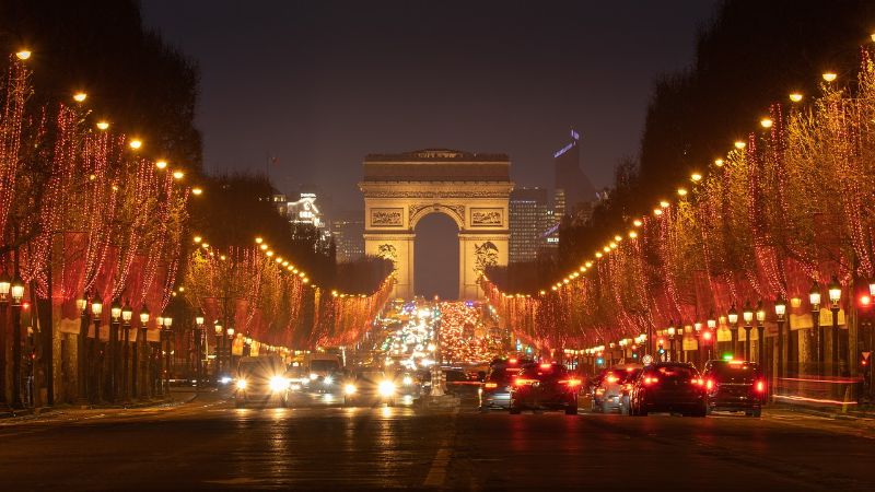 Avenue Champs-Elysees Paris at night, Arc de Triomphe at the center