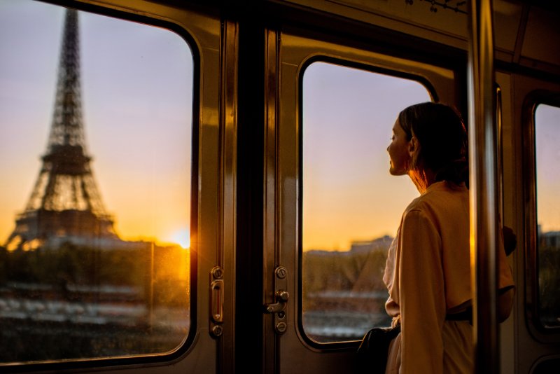 woman enjoying view on the Eiffel tower