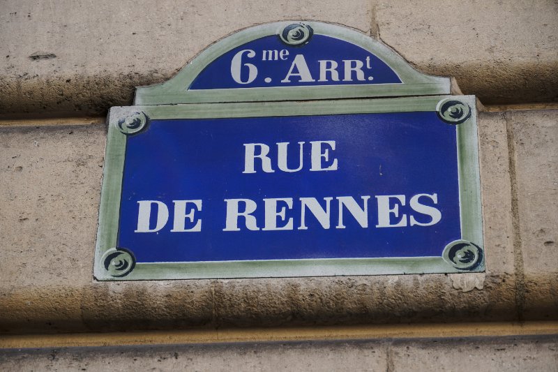 Street sign of Rue de Rennes"