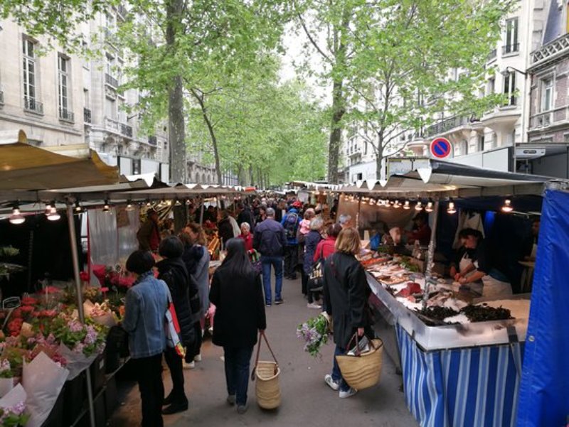 People buying vegetables and groceries