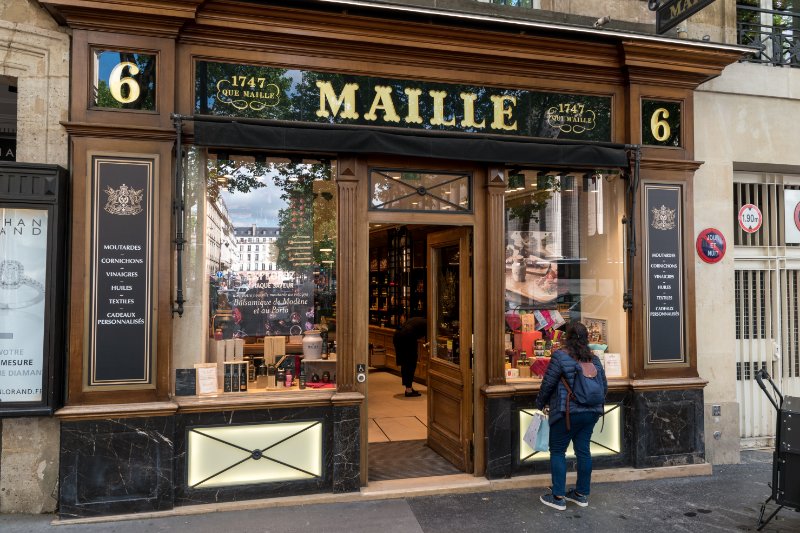 Women standing in front of the store