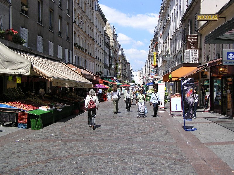 Pedestrian walking on the street at Rue cler