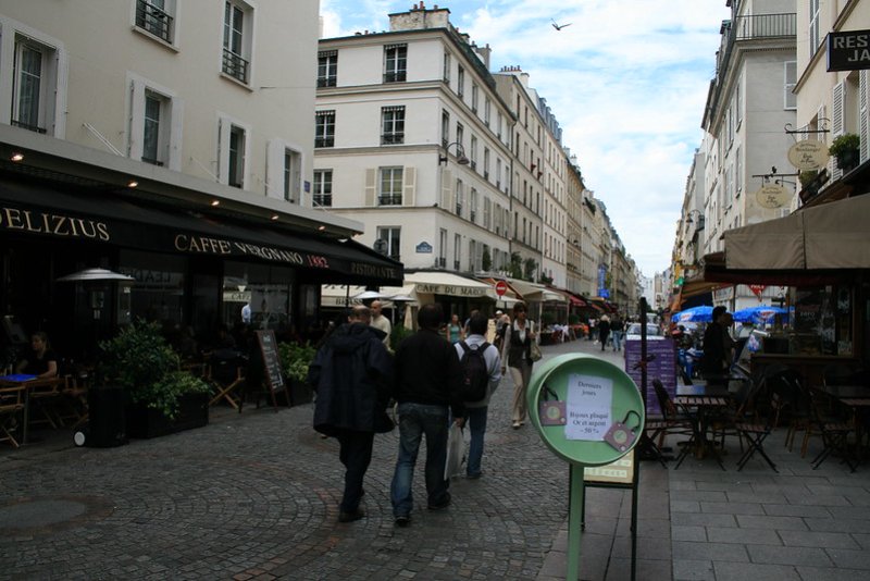 People walking around the Rue CLer