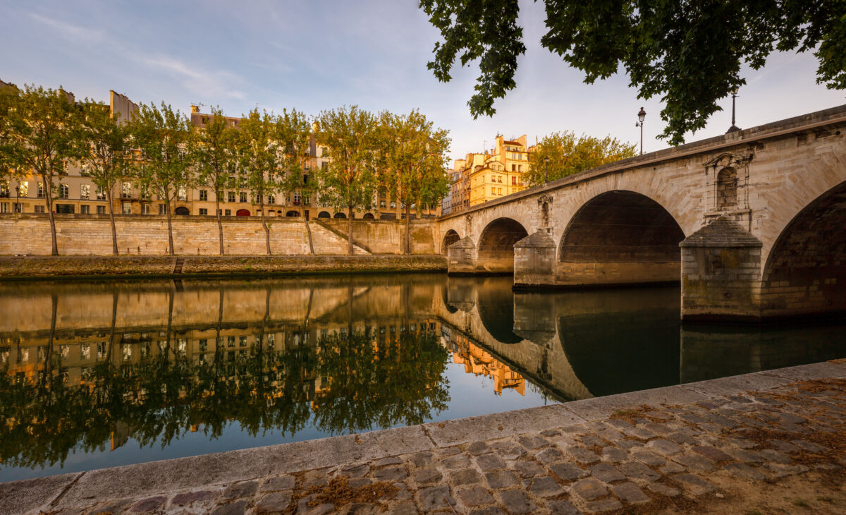 The Pont Marie is a stone bridge that spans the Seine River in Paris, France