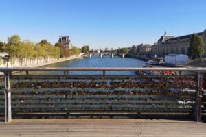 Locks on railing at Passerelle Léopold Sédar Senghor