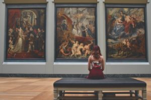 Woman Looking at Museum Exhibit