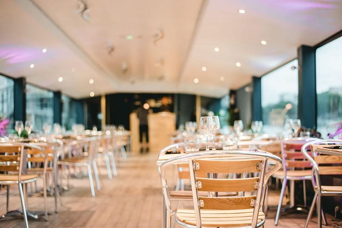 Italian dinner on the river Seine with a classy dining room.