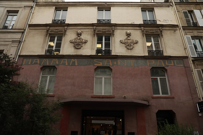 Le Marais Private Walking Tour with classical architectural buildings.