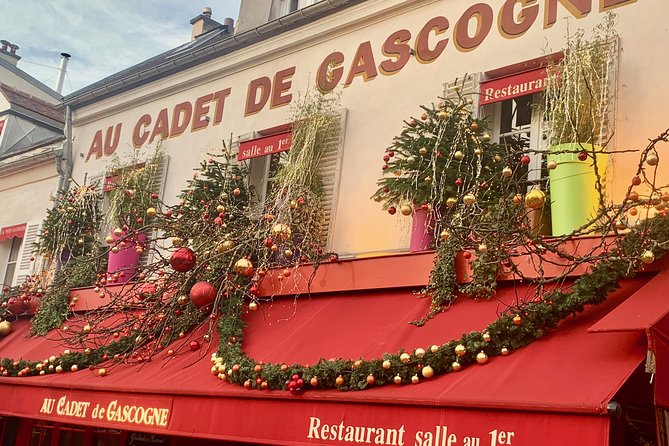 Montmartre Tour Paris with store having a Christmas decoration