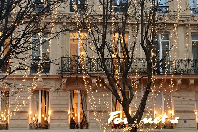 Paris at Christmas with The Champs Elysées & the Arc de Triomphe amazing view during the holidays.