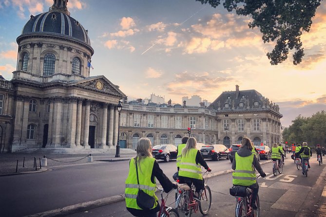 Paris Highlights and Secrets Ultimate Bike Tour cruising through the city