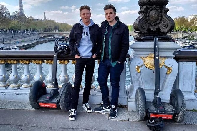 Paris Segway Tour with Ticket for Seine River Cruise with tourists enjoying the ride.