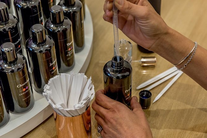 Perfume Workshop in Paris features perfume bottles.