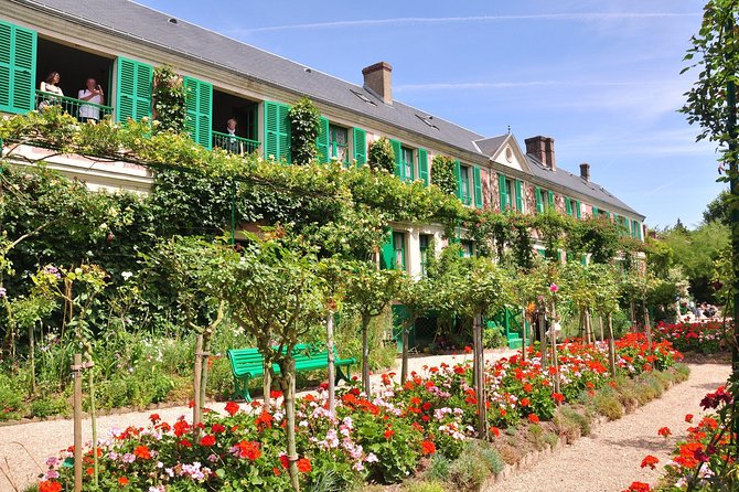 Private Giverny with Minivan with a stroll through the lush gardens of the artist's former home, marvel at the vibrant water lilies at the Japanese Bridge, and discover the charming village that captivated Monet's heart.