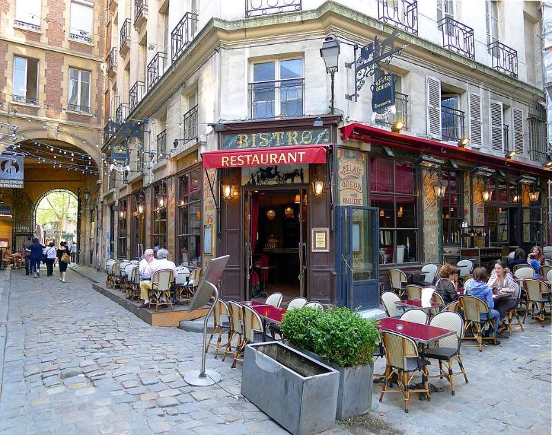 Cour du Commerce-Saint-André Street Arcade with people dining