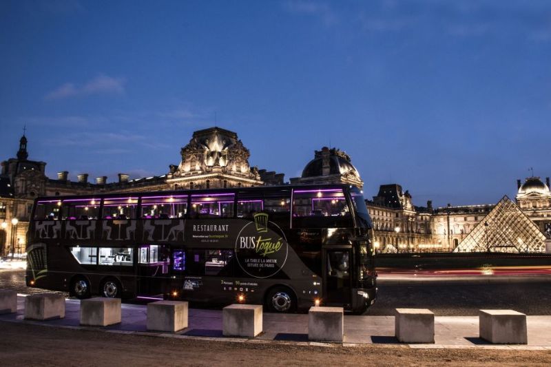 Bus Toqué Tour At Night In Front Of The Louvre Museum