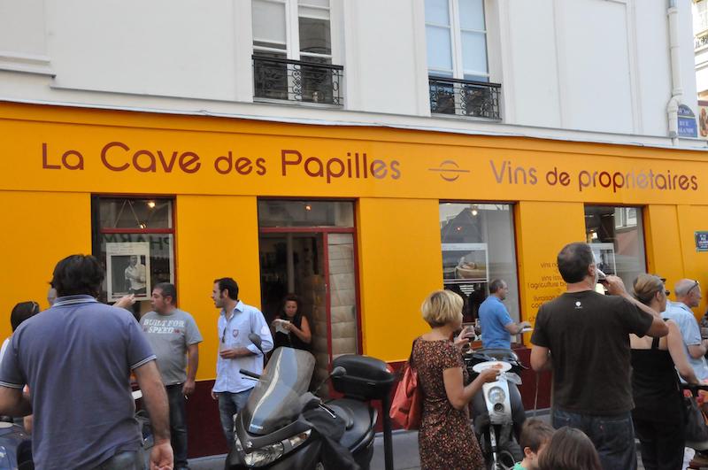 Customers outside of Cave des Papilles in Paris
