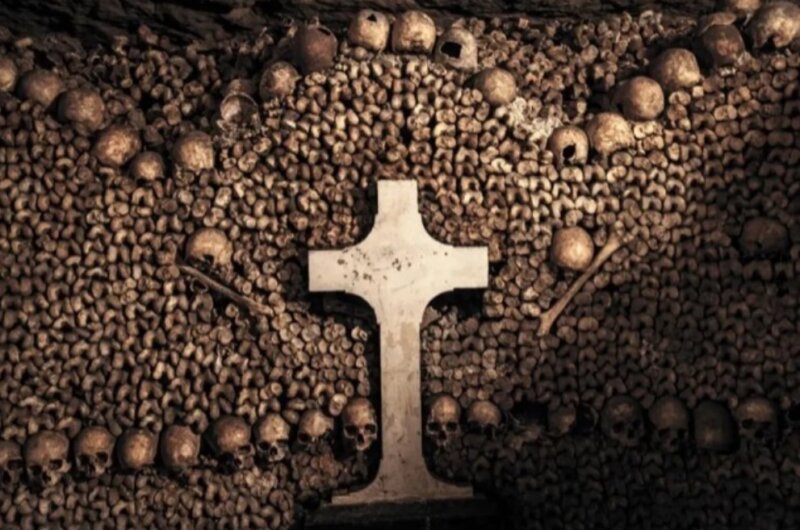 Cross sign inside the Paris Catacombs