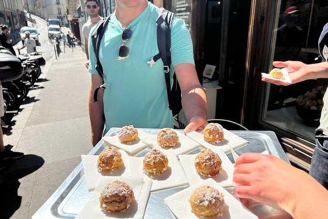 A man tasting French delicacies 