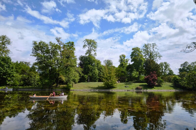 View of lower lake in the Bois de Boulogne and reflections of the nature