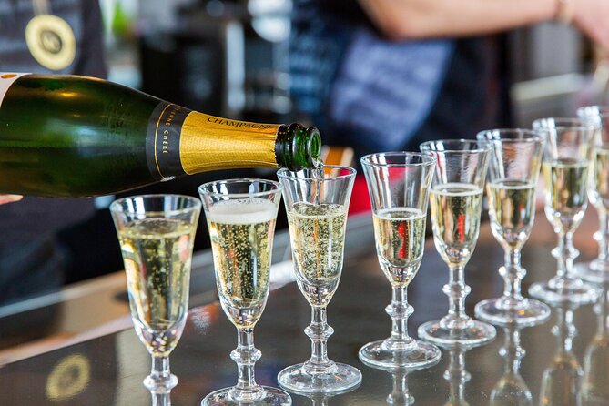 Champagne poured in glasses at Champagne tours in Paris