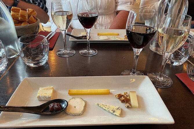 Wine glasses and cheese in Montmartre food tour in Paris