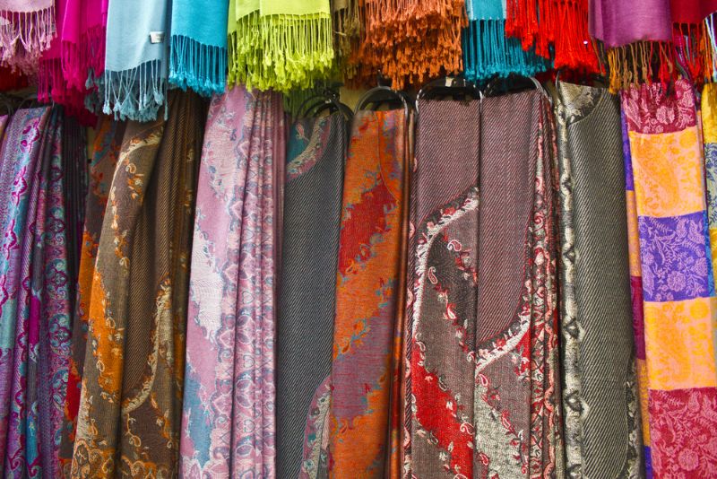 Colorful Scarves Hanging in a Paris Storefront