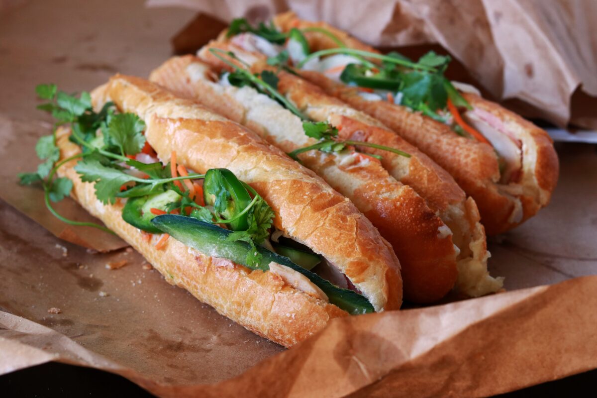 Traditional Vietnamese sandwiches (banh mi) served on parchment paper