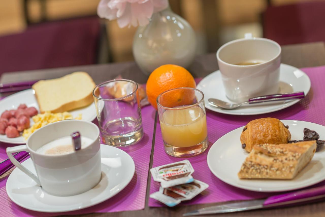 Comfort Hotel Nation Père Lachaise with coffee and bread