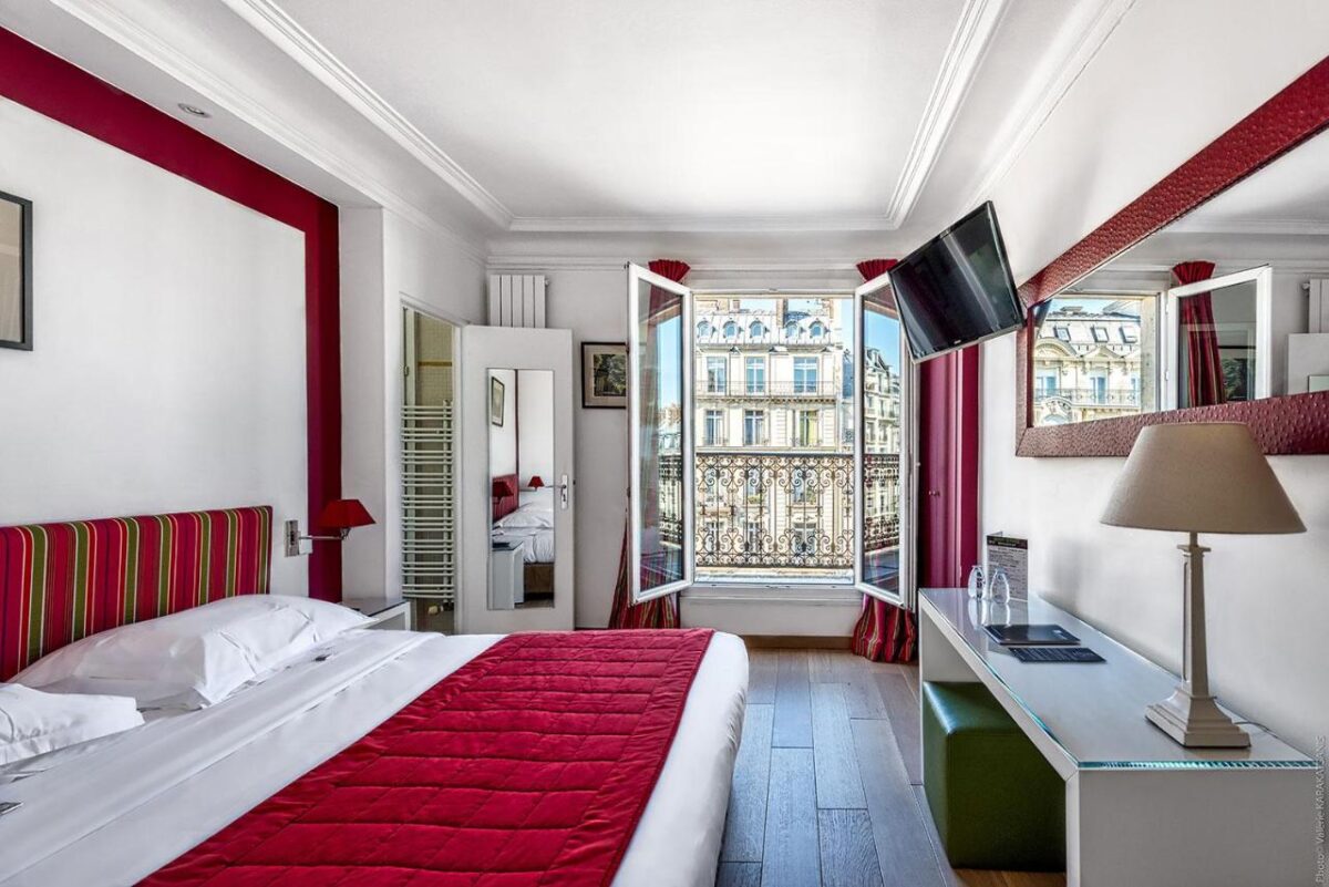 Etoile Park Hotel with an elegant bedroom