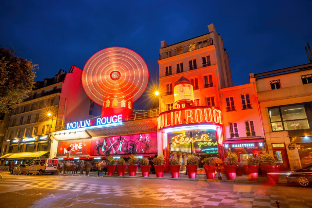 Exterior and lights of Moulin Rouge in Paris, France