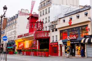 Moulin Rouge is an iconic cabaret in Paris, on Boulevard de Clichy, at Place Blanche, Paris, France