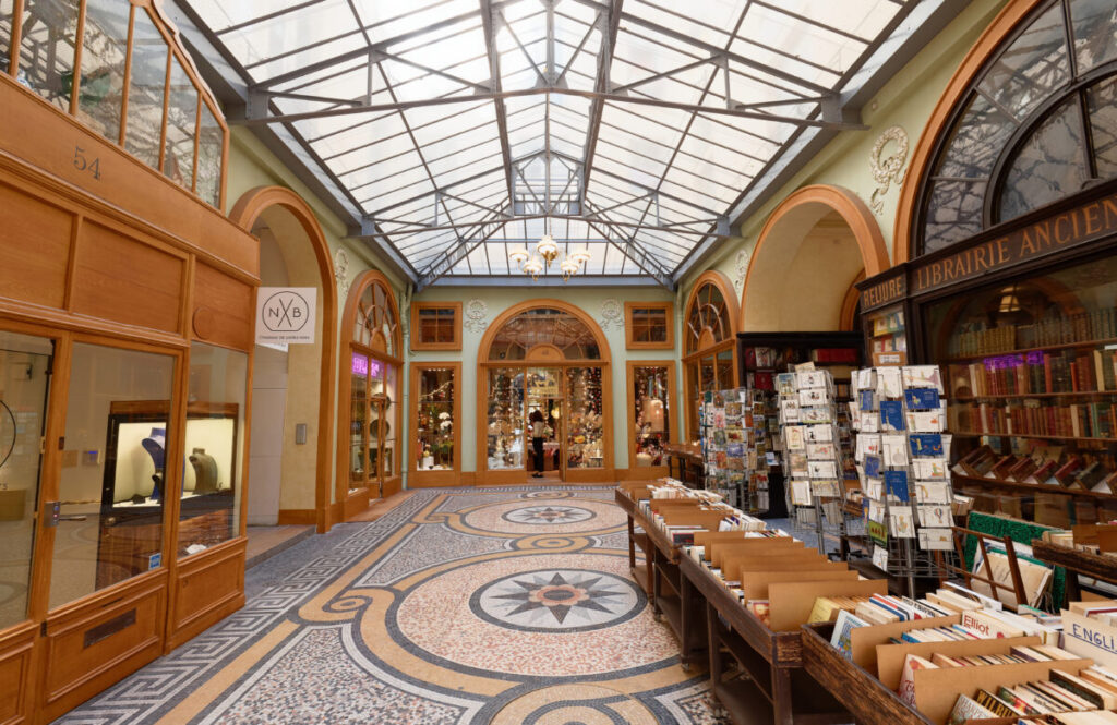 Experience an upscale retail experience at the elegant Galerie Vivienne, an 1823 covered passage boasting an impressive glass roof.