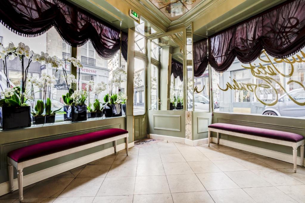 Experience the architectural marvel and captivating design of Hôtel du Petit Moulin in Paris.