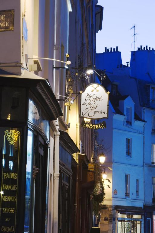Experience a seamless booking process at Hôtel du Petit Moulin in Le Marais, Paris.