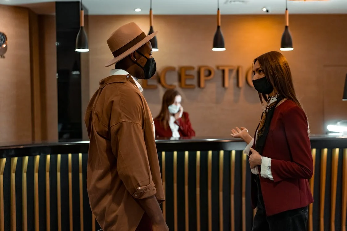 An hotel visitor at the reception