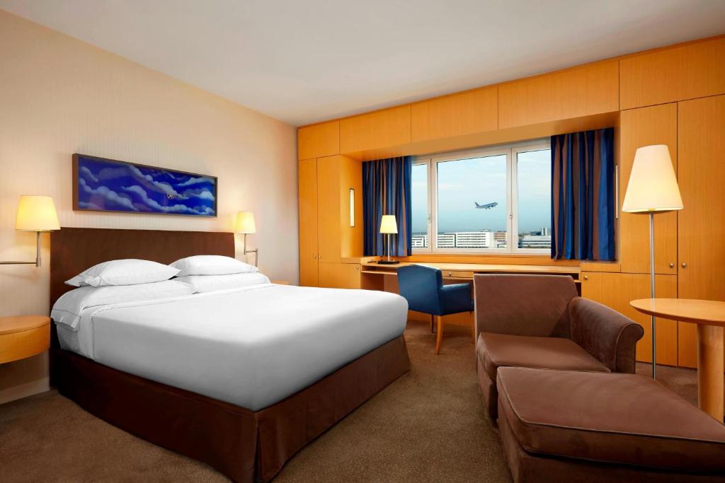 Sheraton Paris Airport Hotel is an upscale, avant-garde hotel in the heart of Paris. Conveniently situated inside the CDG Airport Terminal 2, it offers guests unmatched proximity to flight departures and arrivals. 
