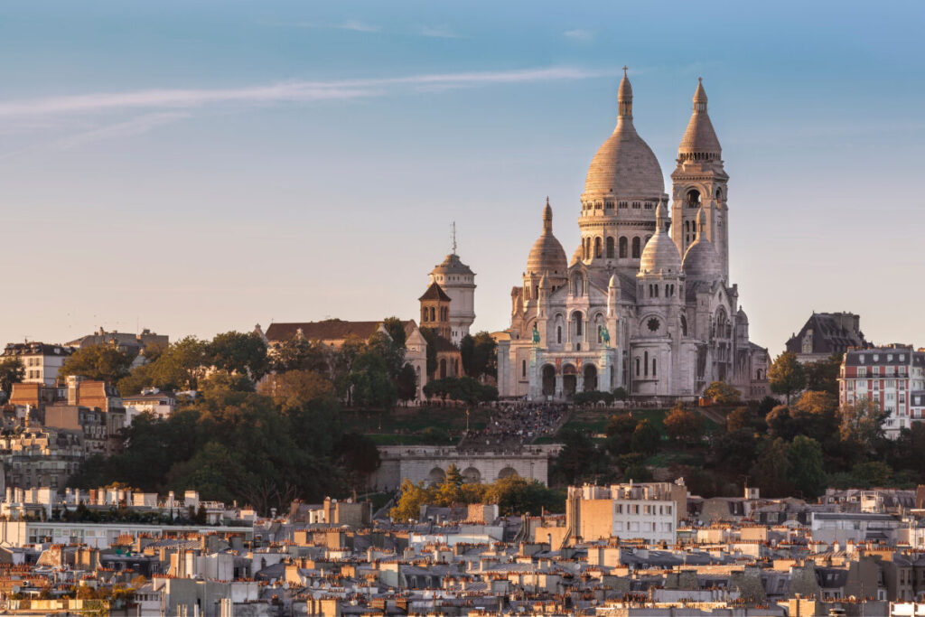 Montmartre, a charming Parisian neighborhood, offers a spectacular setting for watching sunsets.