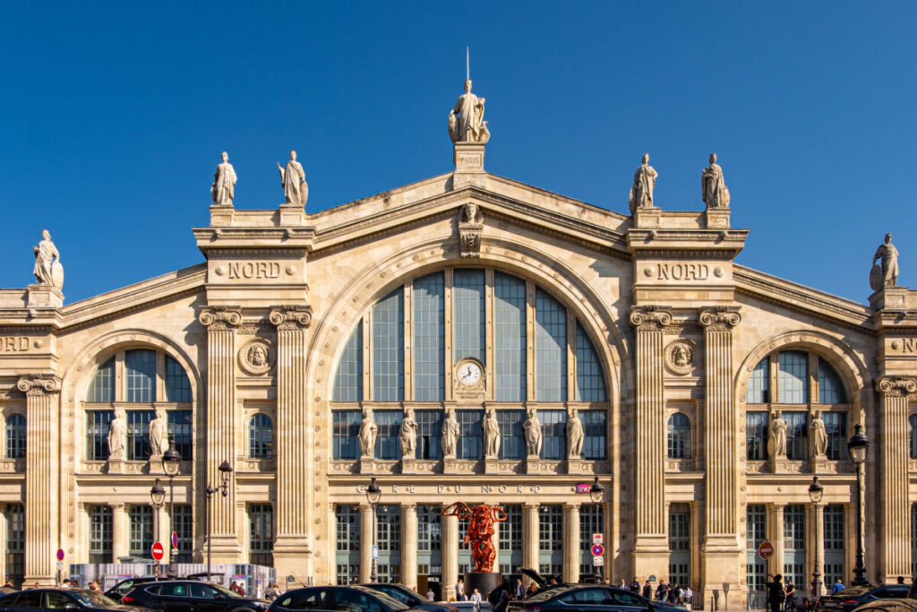 Experience the departure from Gare du Nord in Paris, a bustling and historic railway station connecting the city to various European destinations.
