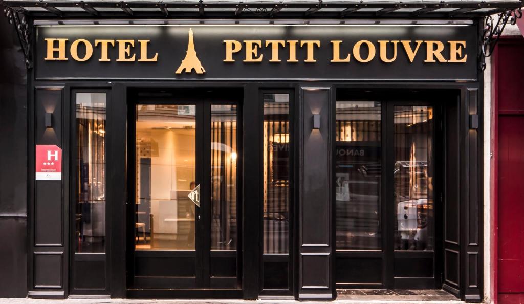 The Hotel Eiffel Petit Louvre welcomes guests with an air of timeless elegance, its charming facade adorned with delicate wrought-iron details echoing the romance of Paris.