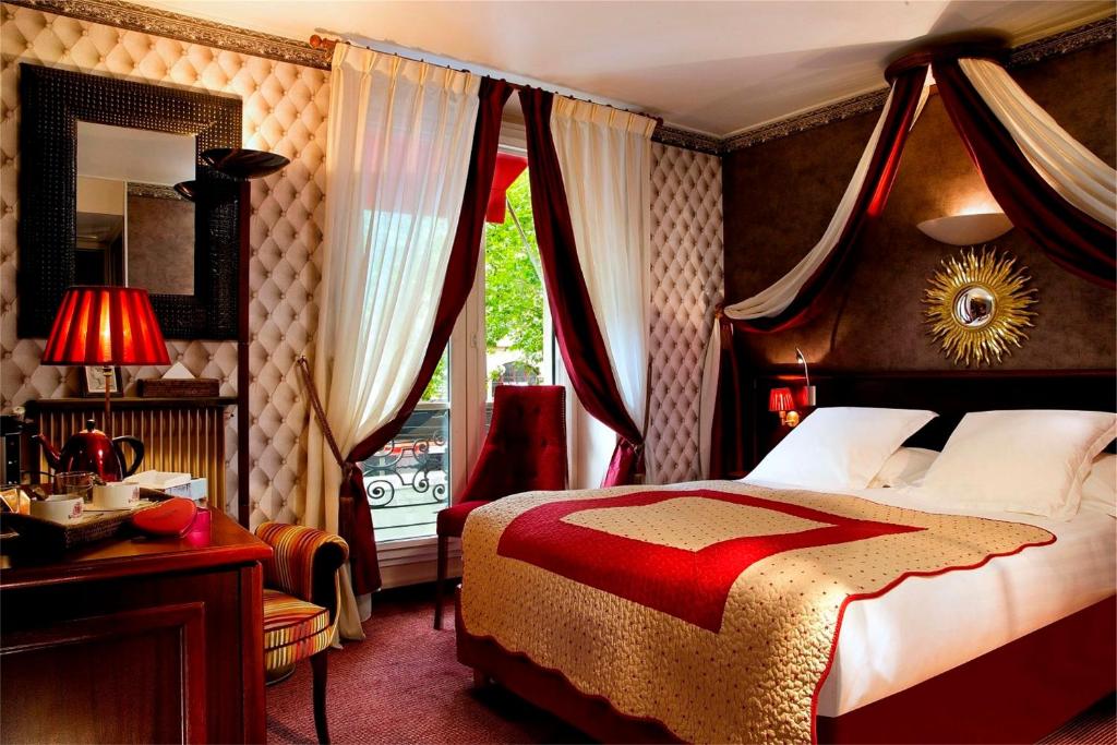 A visual representation of the elegant room features at Britannique Hotel - Paris Centre.