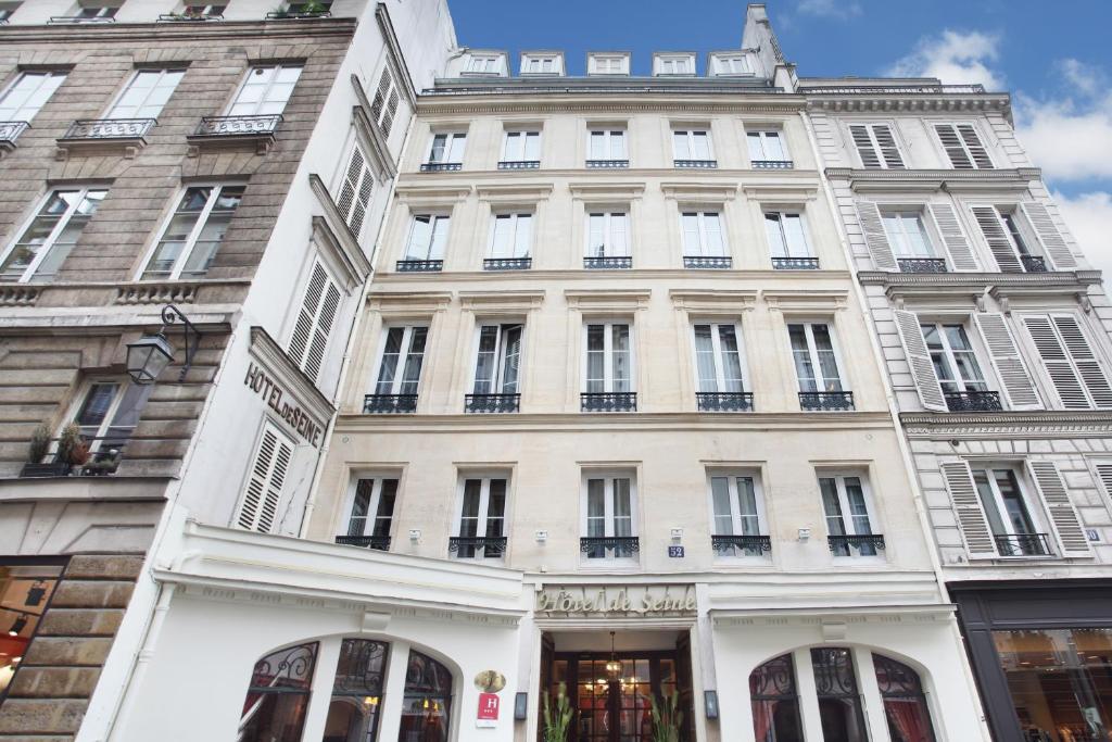 The Hôtel de Seine in Paris 6 Saint Germain Des Prés captivates with its charming facade, adorned with intricate architectural details that evoke a sense of timeless elegance.