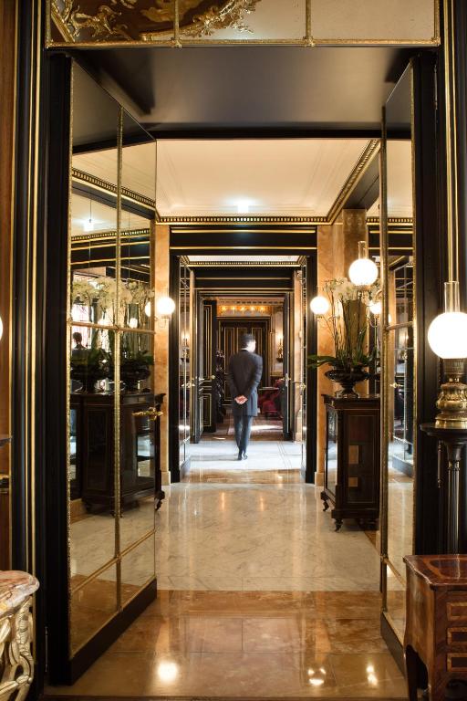 The lobby conveys understated elegance with an inviting palette and luxe furnishings.
