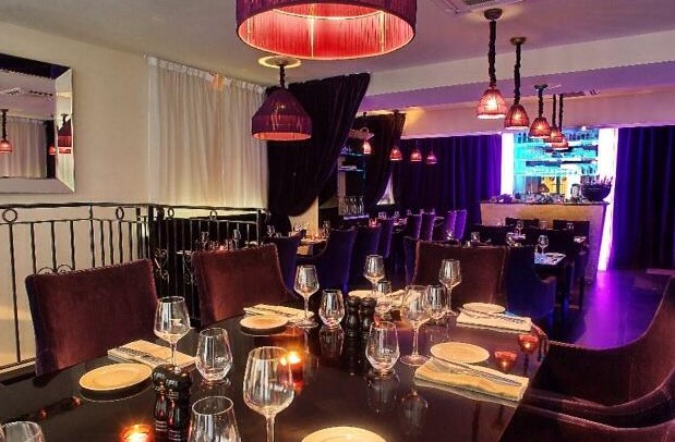 Le Confidentiel Paris, a discreet and stylish establishment, promises an exclusive nightlife experience