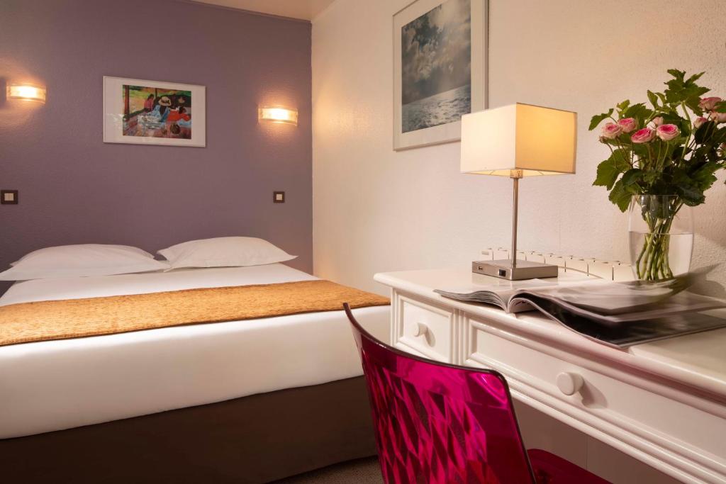 The room features a seamless blend of functionality and elegance, adorned with contemporary furnishings, soft ambient lighting, and thoughtful amenities.