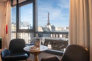 Ramada Paris Tour Eiffel welcomes guests with an enchanting first impression, its facade harmonizing classical Parisian architecture with a modern twist.