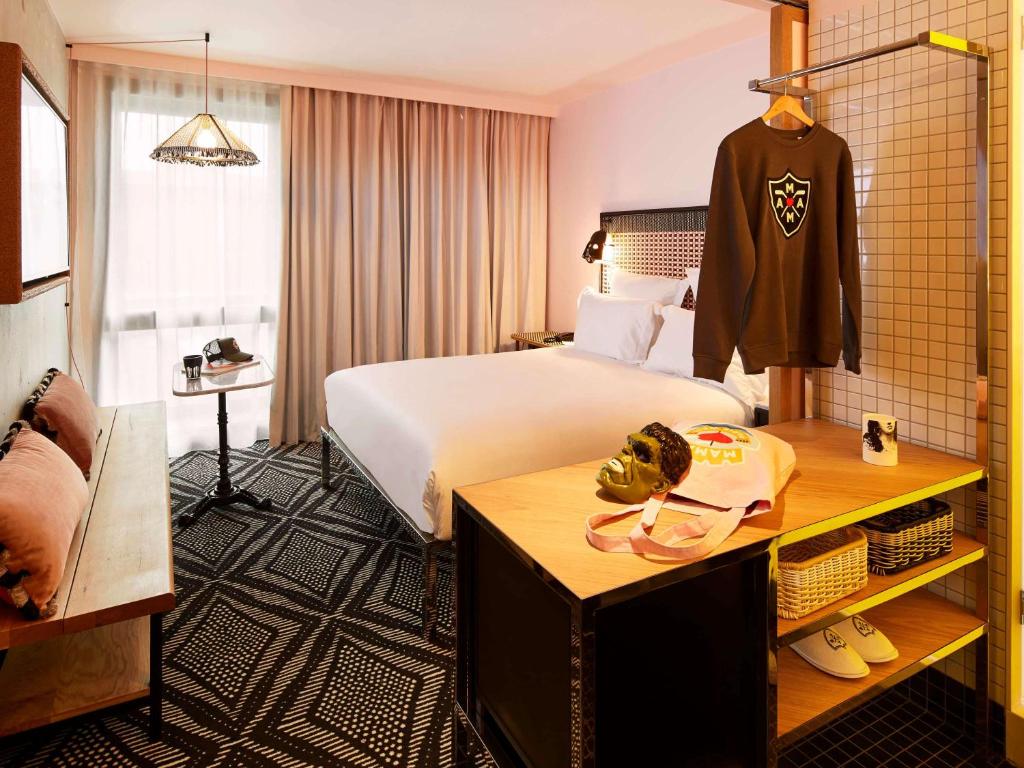 Mama Shelter Paris West rooms offer a perfect blend of comfort and style, featuring contemporary furnishings, playful decor, and modern amenities.
