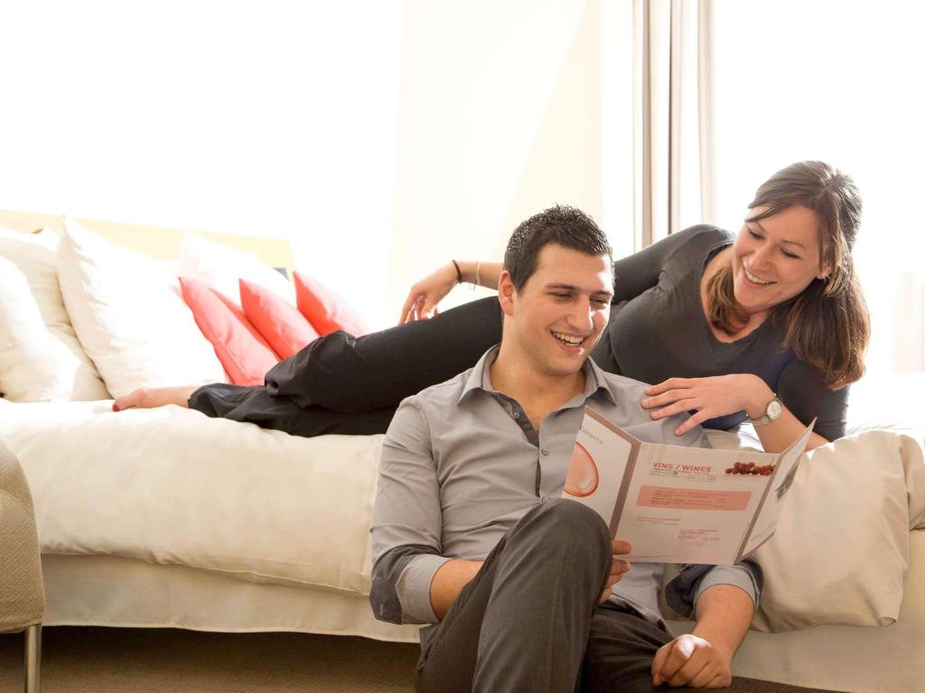 Guests appreciate Novotel Paris Pont de Sevres for its modern amenities, scenic location along the Seine, and the seamless blend of comfort and style in both rooms and common areas.
