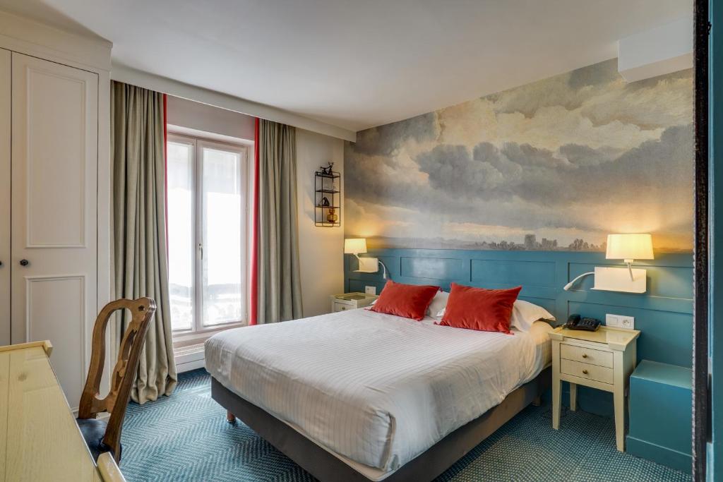 Thoughtfully designed rooms that seamlessly blend comfort and style, boasting amenities such as plush furnishings, ambient lighting, and contemporary decor.