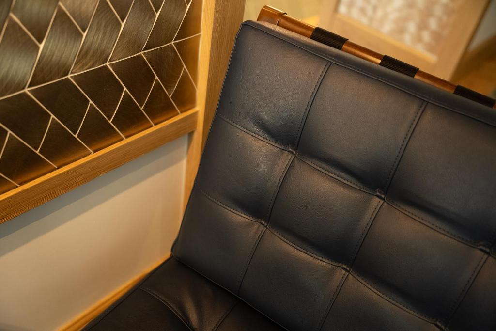 Step into the elegant lobby of Esteem Tour Eiffel, where modern aesthetics blend seamlessly with comfort.